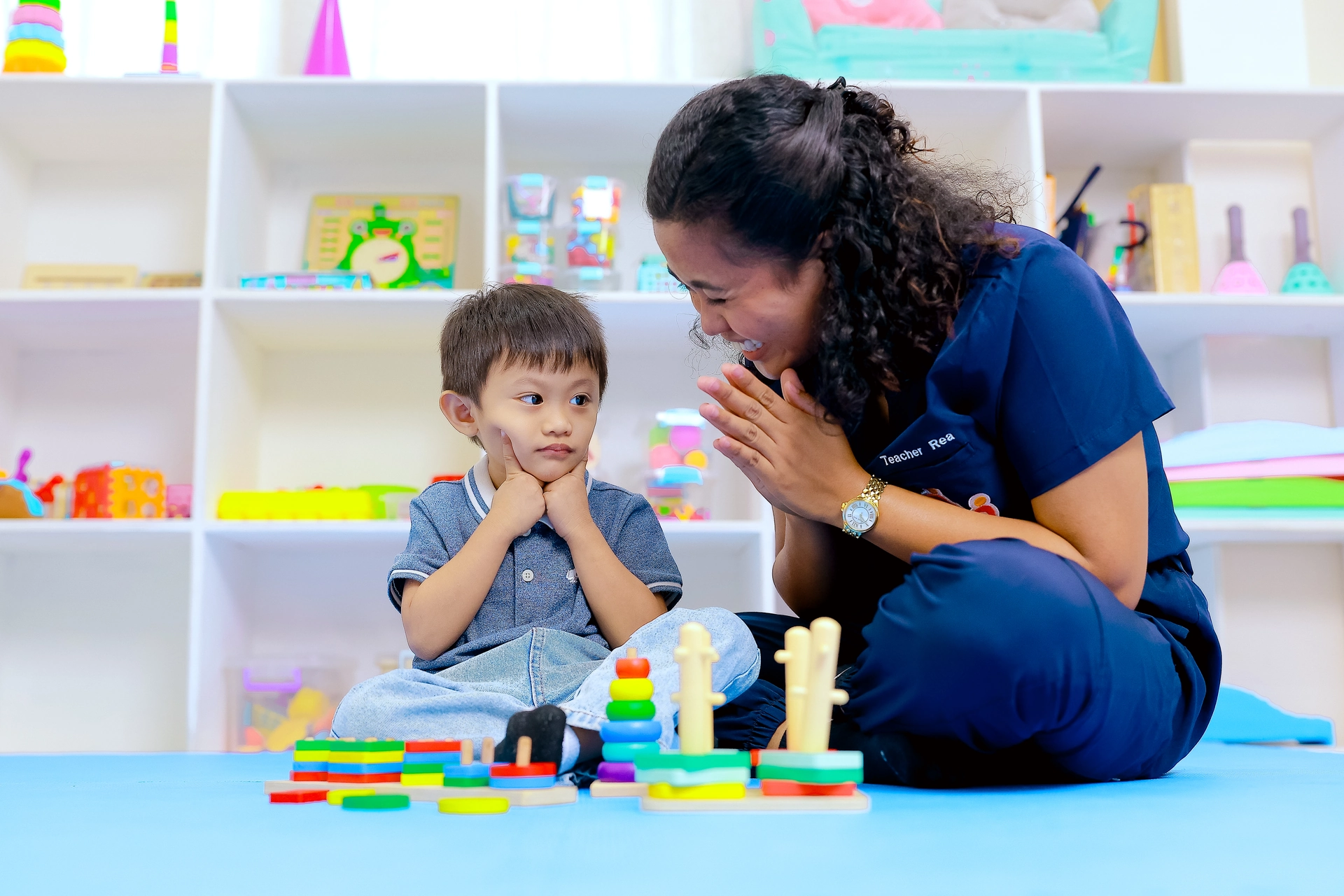 Therapist working with child